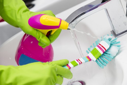 Upholstery cleaning process on a living room armchair